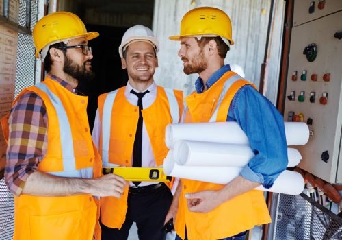 Foreman and his team discussing new structure